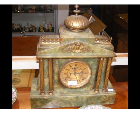 A green onyx mantel clock with gilt columns and two train movement - width 37cm 