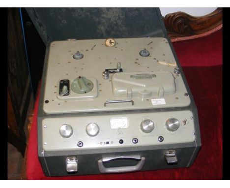 A vintage ferrograph reel to reel in original carrying case