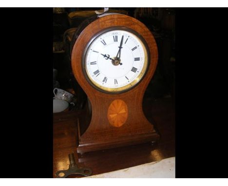 An Edwardian inlaid mantel clock - 22cms high
