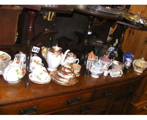A Queen's Virginia Strawberry pattern tea service together with Royal Albert Old Country Roses bowls and other collectables
