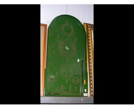 A vintage bagatelle board, together with a selection of pictures 