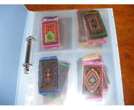 An unusual album of vintage miniature carpet samples 