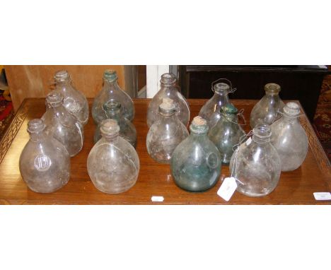 A collection of fourteen vintage glass flytraps 
