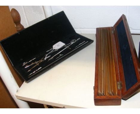 Cased Architect's drawing instruments, including compass and ruler 
