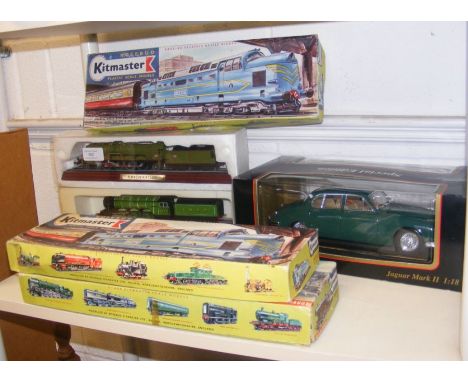 Three boxed Kitmaster scale model trains for 00 and HO gauge tracks, together with die cast Maisto Jaguar car, etc. 