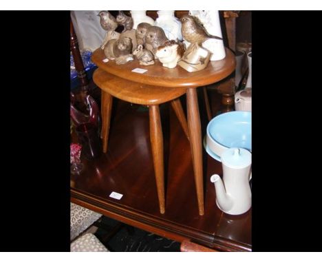 A nest of two Ercol 'pebble' tables 