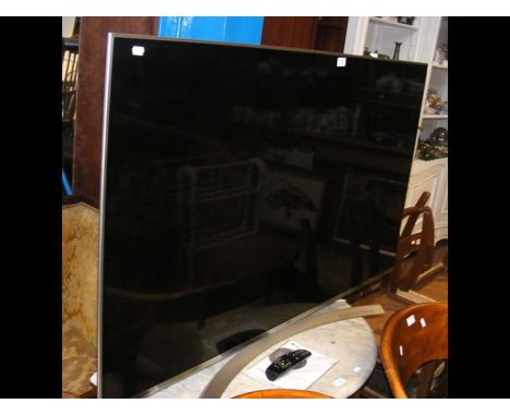 An LG 55'' flat screen TV with remote and owner's manual CONDITION REPORTcondition seems okwas working in the house it came f