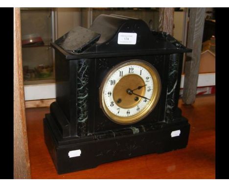 A Victorian slate and marble two train mantel clock 