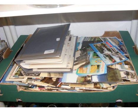 A generous collection of vintage postcards - loose and in an album 