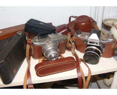 An assortment of vintage cameras, together with Swarovski binoculars, including Koroll 24S by Bencini, pocket Kodak and Carl 