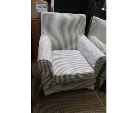 A silver &amp; white gingham covered arm chair