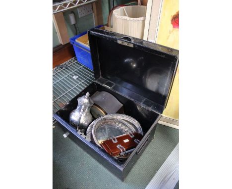 A deed box containing a pair of silver plate serving dishes, a tie press, mantel clock etc