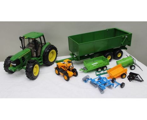 A Britains ERTL large scale model of a John Deere 6930 Tractor , with 42512 four wheel Grain Trailer, together with assorted 