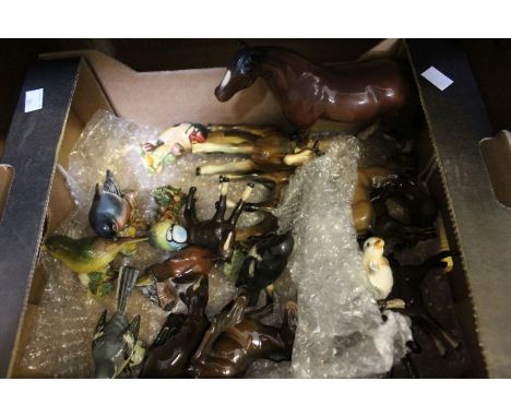 A selection of ceramic model horses and birds, to include Beswick