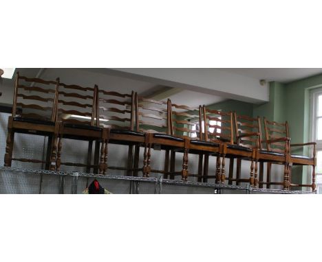 A set of eight Willis and Gambier ladder back dining chairs (6 singles 2 carvers) 