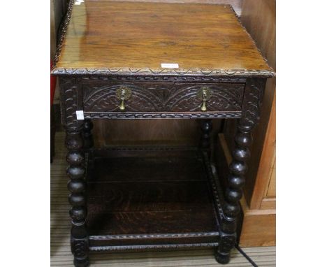 Oak two tier side table with single drawer on bobbin legs with carved decoration