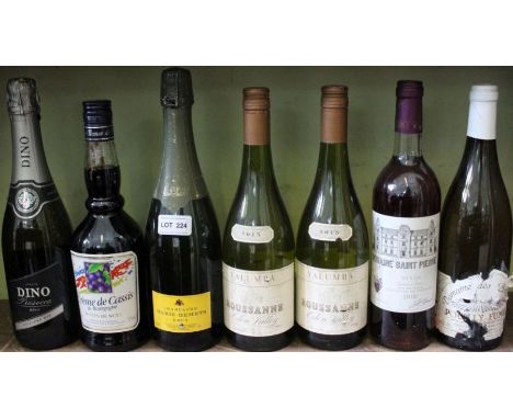 A shelf full of mixed wines