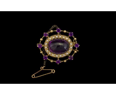 Edwardian Style Good Quality Amethyst and Seed Pearl Set Ladies Brooch of Oval Form. The Central Large Cabochon Cut Amethysts