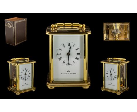 Matthew Norman Top Quality Brass Carriage Clock. Features 11 Jewels, Unjusted Movement, White Porcelain Dial, Visible Lever P