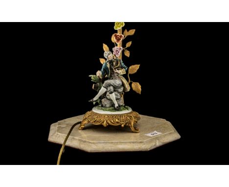 Capodimonte Figural Electric Lamp with Shade fitted on a marble base depicting a Dandie sitting on a tree trunk base. Signed 