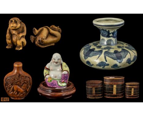 Mixed Oriental Lot comprising small Buddha figure, blue pottery vase decorated with bats, wood netsuke of a monkey, carved wo