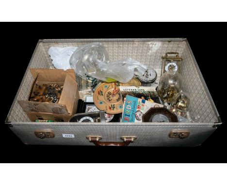 Large Checked Vintage Suitcase with contents:  comprising; cuckoo clock; vintage Charlie Chaplin home movie tape; poster of M