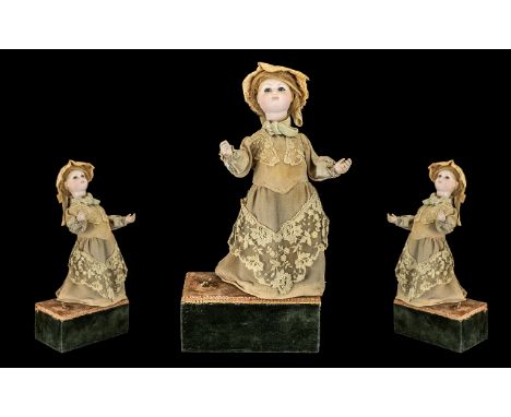 Mid Victorian Fine Quality Wind Up Musical Bisque Headed Doll Automaton; head, arms and body move while music plays from the 