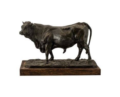 Spelter Figure of a Prize Bull after the antique model by P.J.Mene, on a wooden base.  Width 14", 10" tall.