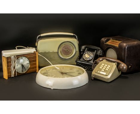 A Mixed Collection of Radios and Telephones to include Bush Radio, Smiths Astral Wall Clock, Alba Radio Alarm, Bakelite Bush 