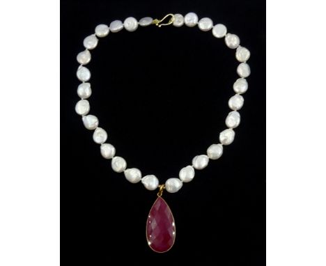Silver-gilt faceted ruby pendant stamped 925, on pearl necklace Condition Report Necklace length = 51cm, pendant = 6.5cmClick