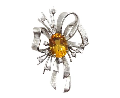 French 18ct white gold oval citrine and round brilliant cut diamond bow spray brooch, eagle hallmark Condition Report Approx 