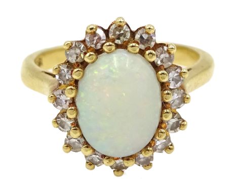 Gold opal and diamond cluster ring, stamped 18ct Condition Report Approx 4.7gm, size J-K, opal = 8mm x 7mm, overall head = 13