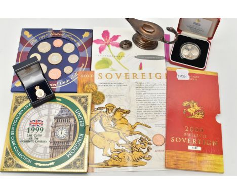A CARDED BULLION FULL SOVEREIGN COIN AND A SMALL QUANTITY OF ITEMS, to include a carded full gold sovereign, depicting Queen 