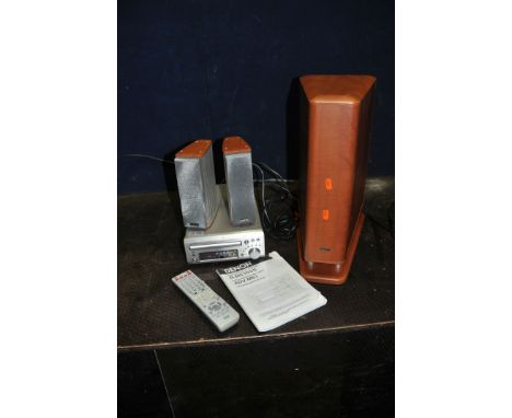 A DENON ADV-M51 DVD SURROUND RECEIVER, a DSW-3L subwoofer and  a pair of SC-A3L speakers with remote and manual (PAT pass and