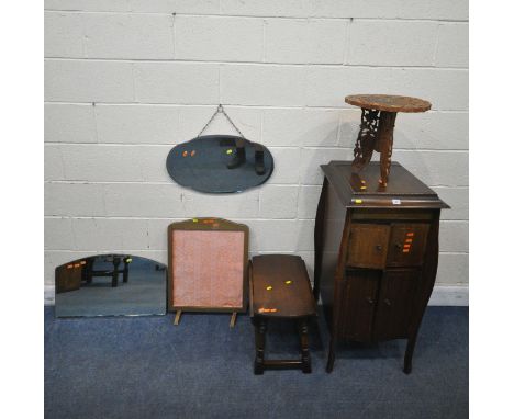 AN EARLY 20TH CENTURY MAHOGANY GRAMOPHONE CABINET, with a hinged lid and two pairs of doors, width 48cm x depth 52cm x height