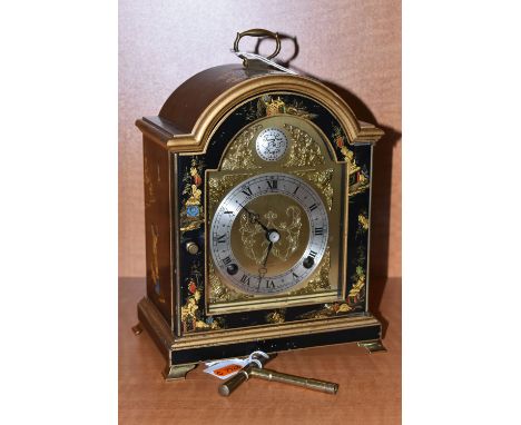 A MODERN ELLIOTT OF LONDON LACQUERED MANTEL CLOCK WITH CHINOISERIE DECORATION, with carrying handle to the arched top, silver