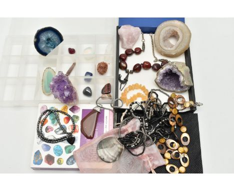 A SELECTION OF GEMSTONE SPECIMENS, to include an amethyst geode, an amethyst crystal specimen, a dyed blue quartz geode, a co