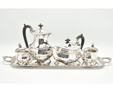 A FOUR PIECE SILVER PLATED TEA SET WITH TRAY, comprising of a polished teapot, coffee pot, sugar bowl and milk jug, with gadr