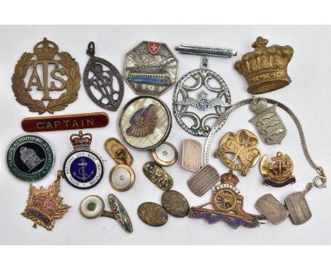 A SELECTION OF MAINLY BADGES, to include a pair of silver engine turned cufflinks, with silver hallmark, a cap badge, RAF bro