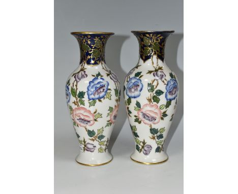 A PAIR OF FREDERICK RHEAD FOR WOOD AND SONS VASES, the pate sur pate baluster shaped vases decorated with pink, blue and purp
