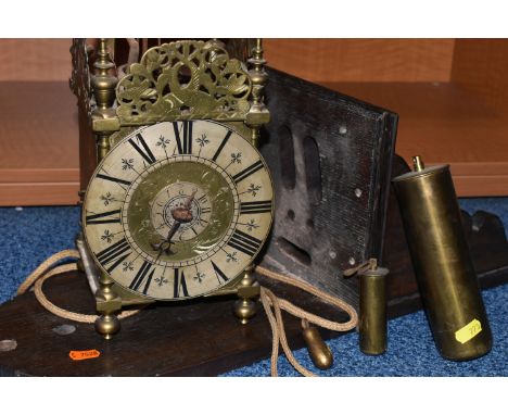 A 17TH CENTURY STYLE BRASS LANTERN CLOCK, four posted case with side doors and side frets, silvered chapter ring, engraved br