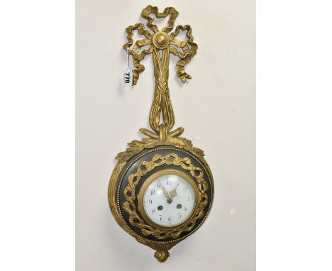 A LATE 19TH / EARLY 20TH CENTURY CARTEL CLOCK BY SAMUEL MARTI, cast gilt metal ribbon and wreath case, enamel dial with Arabi