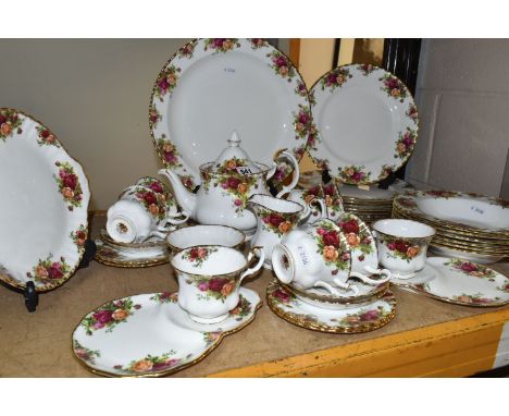 A GROUP OF ROYAL ALBERT 'OLD COUNTRY ROSES' PATTERN DINNERWARE, comprising a large chop dish (marked as second quality), eigh