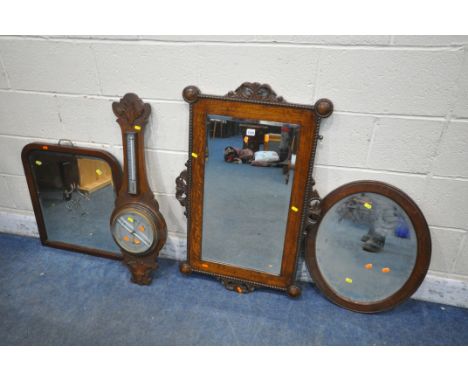 A RECTANGULAR CARVED OAK BEVELLED EDGE WALL MIRROR, 95cm x 63cm, two other wall mirrors, a dressing mirror and an oak baromet