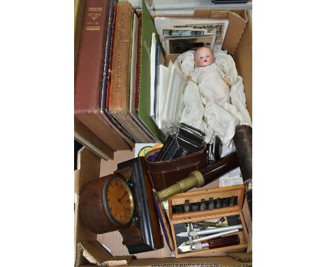 A BOX OF BOOKS, DOLL, CLOCK, TELESCOPE AND SUNDRY ITEMS, to include  a cased 19th century telescope, three drawer mahogany an