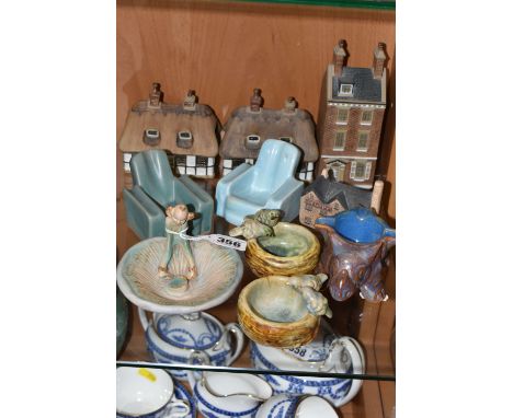 A GROUP OF DENBY VILLAGE ORNAMENTS AND OTHER CERAMICS, comprising a Georgian Town House, two Thatched Cottages, a Filip Laure