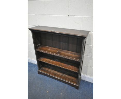 AN EARLY TO MID 20TH CENTURY OAK OPEN BOOKCASE, with three adjustable shelves, width 101cm x depth 27cm x height 110cm (condi