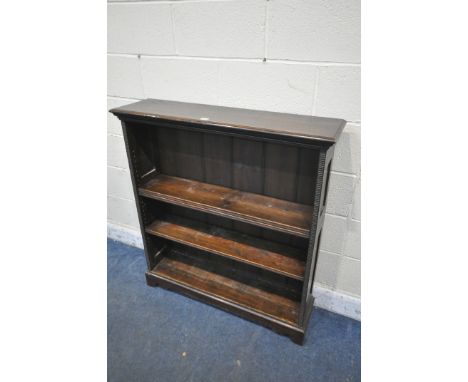 AN EARLY TO MID 20TH CENTURY OAK OPEN BOOKCASE, with three adjustable shelves, width 101cm x depth 27cm x height 110cm (condi