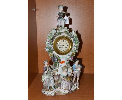 A LATE 19TH CENTURY MEISSEN PORCELAIN FIGURAL MANTEL CLOCK OF BALLOON SHAPE, mould no .572, with seated girl finial above the