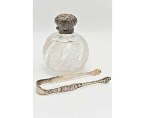 A PAIR OF SILVER SUGAR TONGS AND A SCENT BOTTLE, floral and fruit pattern tongs with engraved initials to the terminal, hallm